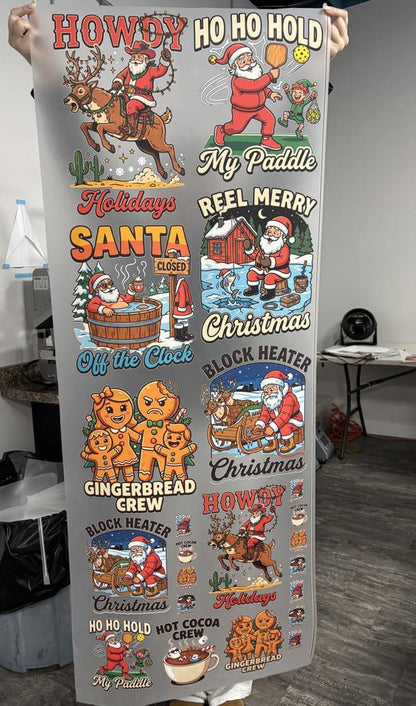 Real photo: printed Christmas Gang Sheet 2 (Howdy Holidays sheet) held up in the YSSDTF shop