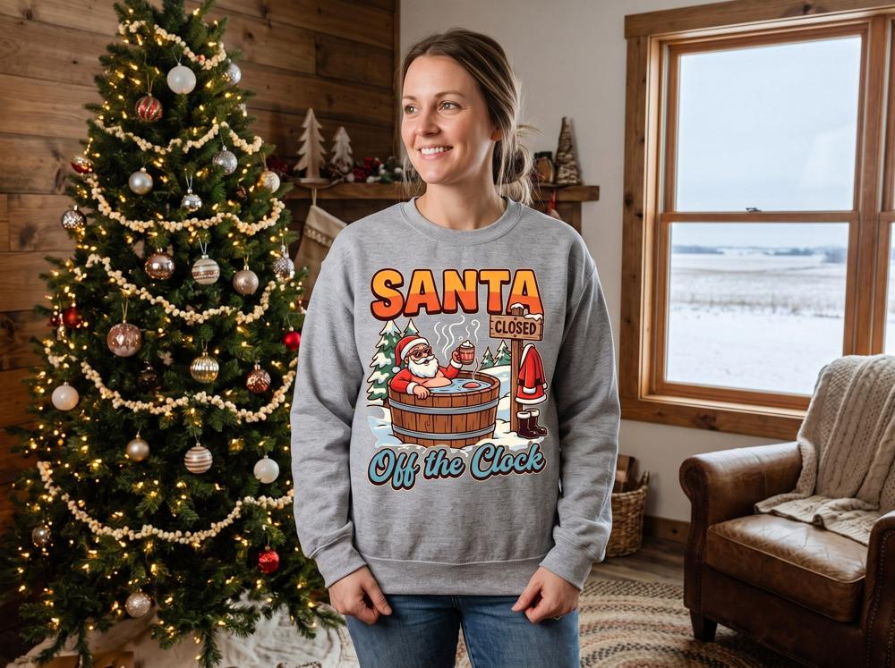 Santa Off the Clock DTF transfer pressed on a crewneck sweatshirt